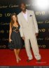 john-salley-with-wife-3rd-annual-loveday-launch-love-charity-bracelet-arrivals-3woChY.jpg