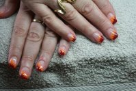 Retouche ongles en gel French oblique rouge et ora.jpg
